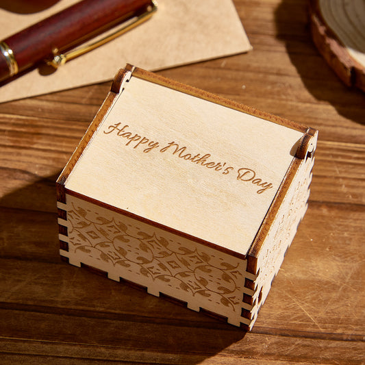 Personalized wooden music box engraved with 'Happy Mother's Day', a unique gift for Mom.