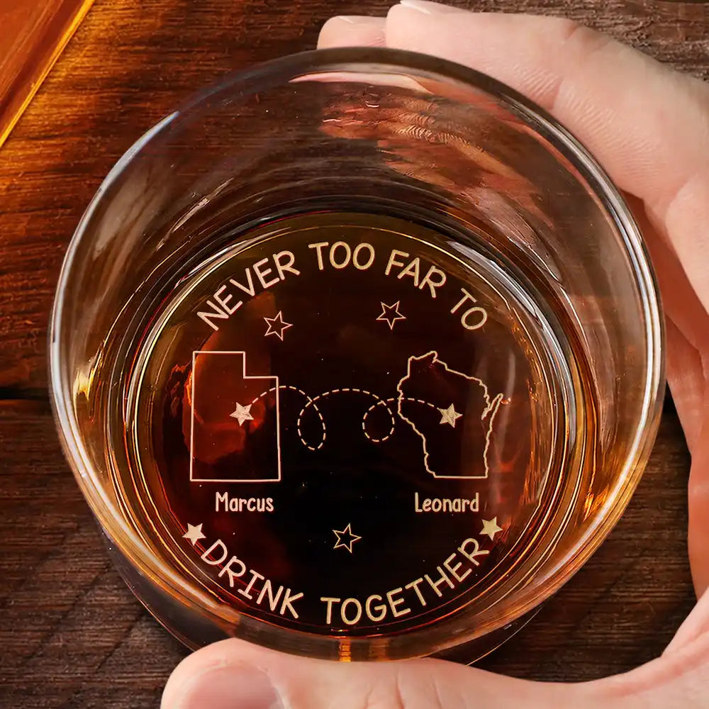 Personalized engraved whiskey glass with 'Never Too Far To Drink Together' design, a perfect gift for friends and family.